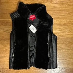 Black synthetic fur/ leather vest with silver zippers.. Brand new